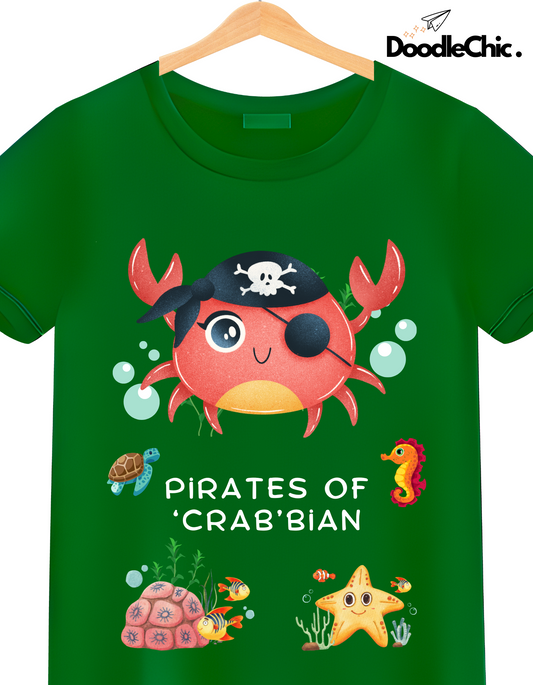 Close-up of Doodlechic Pirates of Crab'bian green kids T-shirt with pirate crab, turtle, seahorse, and coral reef on organic cotton.