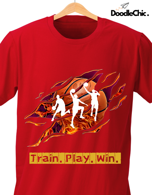 Close-up of Train Play Win - DoodleChic 100% Organic Cotton Kids' Red T-shirt featuring bold sports graphic with basketball and player silhouettes.