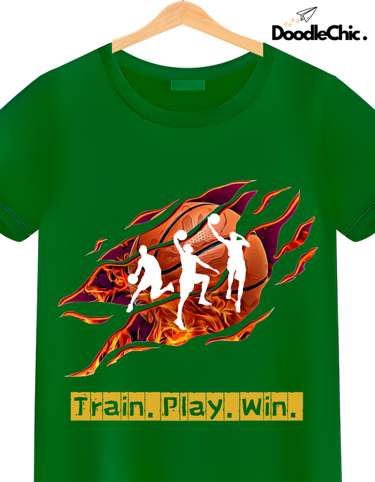 Close-up of Train Play Win- DoodleChic 100% Organic Cotton Green Kids T-shirt with bold sports-themed design and vibrant flame effects.