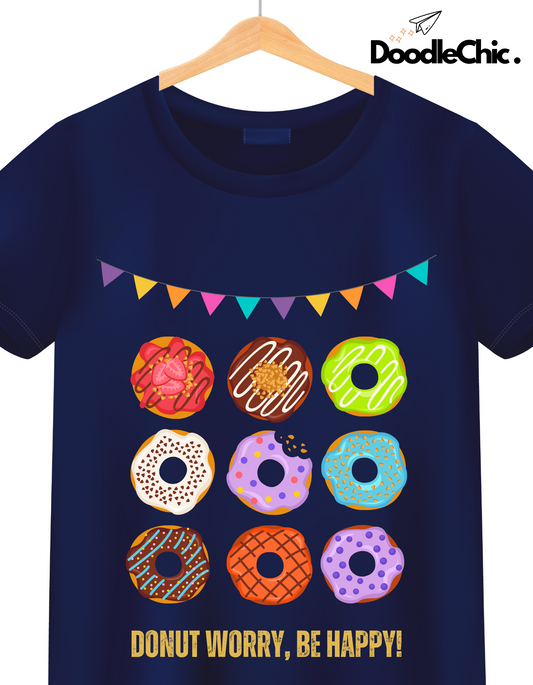 Close-up of Donut Worry - Doodlechic 100% Organic Cotton Navy Blue Kids T-shirt with vibrant donut prints and cheerful banner design.