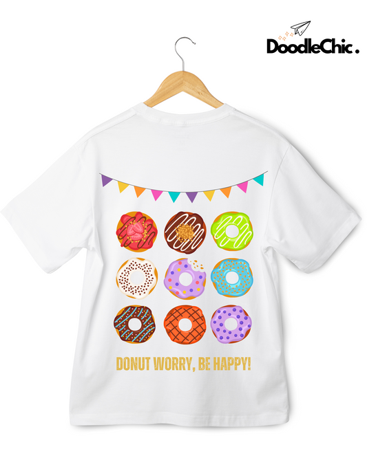 Donut Worry Be Happy-DoodleChic 100% Organic Cotton White Kids T-shirt shown on hanger with colorful donut design and eco-friendly branding.