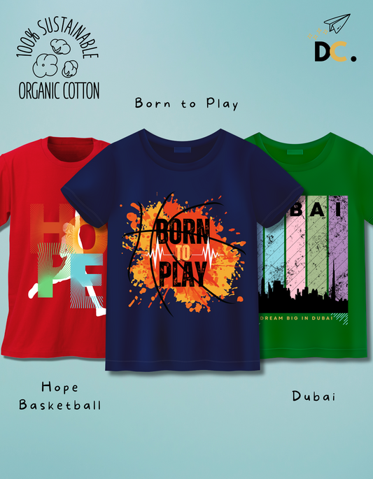 Set of 3 kids t-shirts made from 100% organic cotton with vibrant prints: navy 'Born to Play', red 'Hope Basketball', and green 'Dubai'.