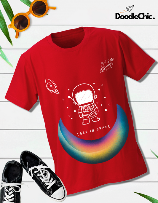 Space by DoodleChic - 100% Organic Cotton Red Printed T-shirt for Kids laid flat with shoes and sunglasses, showcasing playful space-themed design. Perfect for stylish young explorers.
