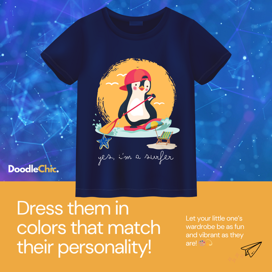 DoodleChic Penguin Surfer Organic Cotton Navy Blue Kids T-shirt shown with vibrant background, highlighting playful beach-themed penguin design.