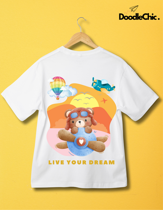 Live Your Dream by DoodleChic - Organic Cotton White Kids T-shirt with colorful bear pilot design, ideal for eco-conscious children's fashion.