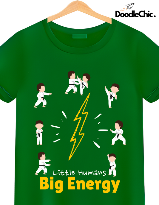 Close-up of Little Humans - Doodlechic 100% Organic Cotton Green Kids T-shirt featuring martial arts cartoon characters and lightning bolt design.