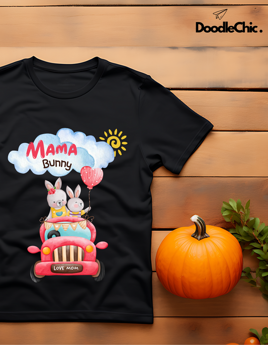 Mama Bunny Love by DoodleChic - 100% Organic Cotton Black Kids T-shirt styled with autumn decor, showcasing playful bunny illustration in a red car.