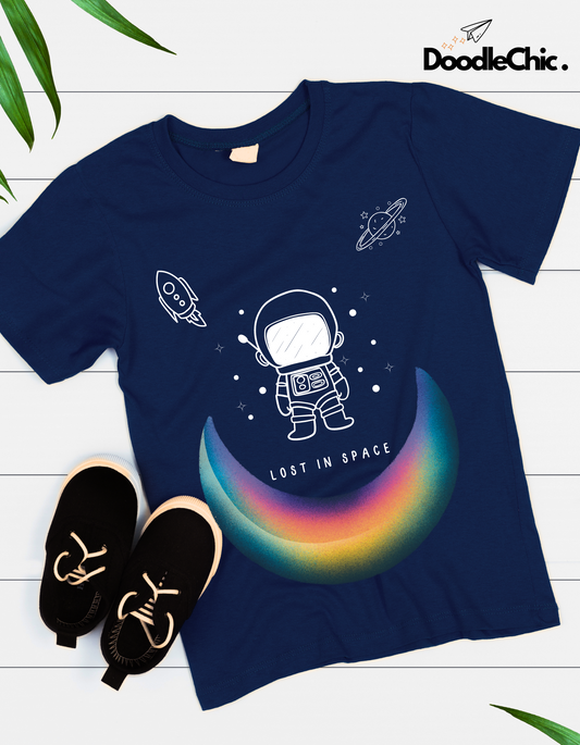 Space by DoodleChic-100% Organic Cotton Navy Blue Printed Kids T-shirt styled with shoes, showcasing a vibrant space-themed design for sustainable kids fashion.