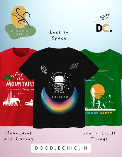 DoodleChic Pack of 3 Kids 100% Organic Cotton T-shirts- Little Things, Mountains and Space. Three t-shirts with different designs and text on a light blue background.