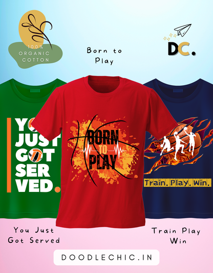 DoodleChic Pack of 3 Kids 100% Organic Cotton T-shirts- Born to Play, Train Play Win, You Just Got Served. Three t-shirts with sports-themed designs and text on a colorful background.