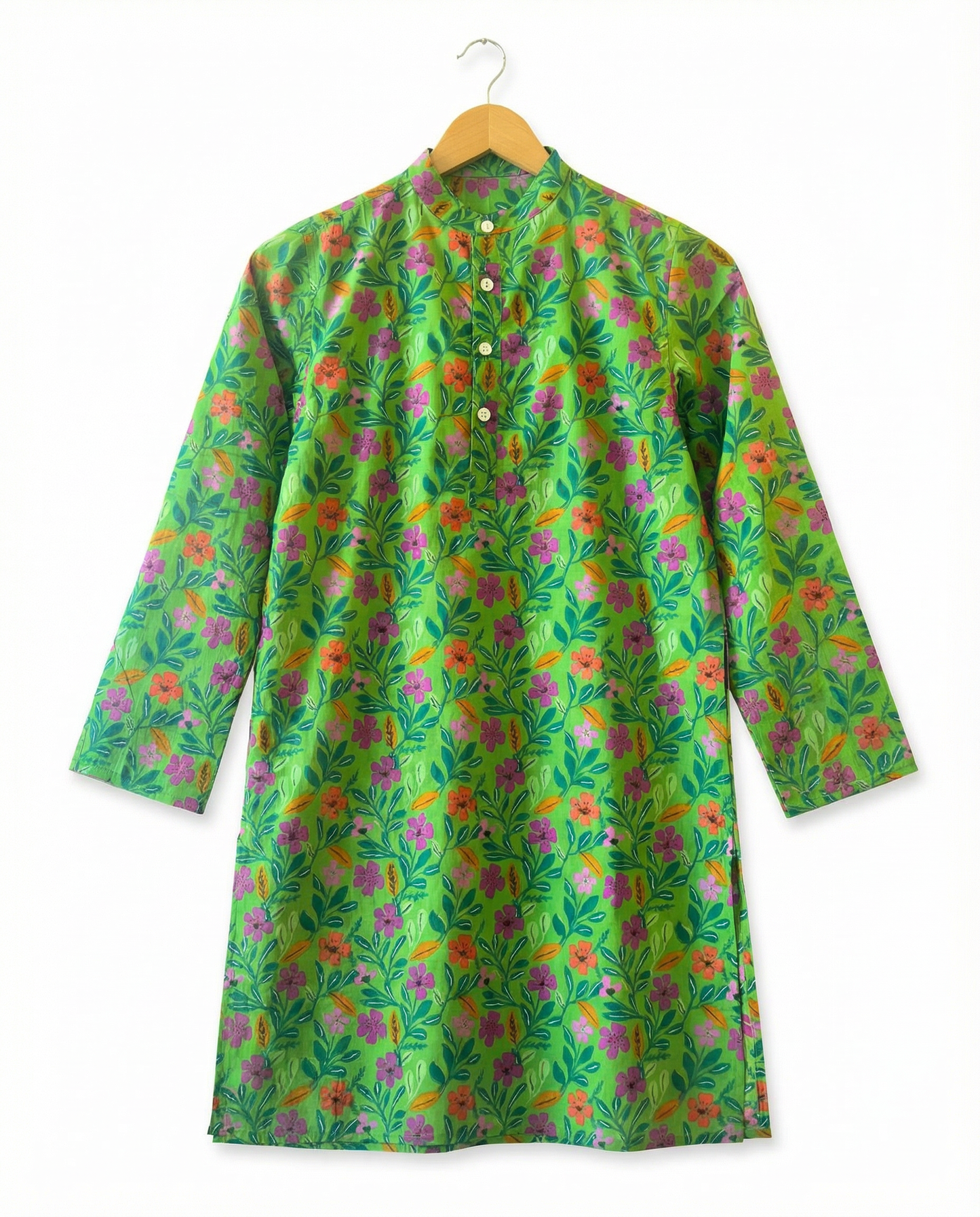Green floral patterned kurta on a hanger against a white background